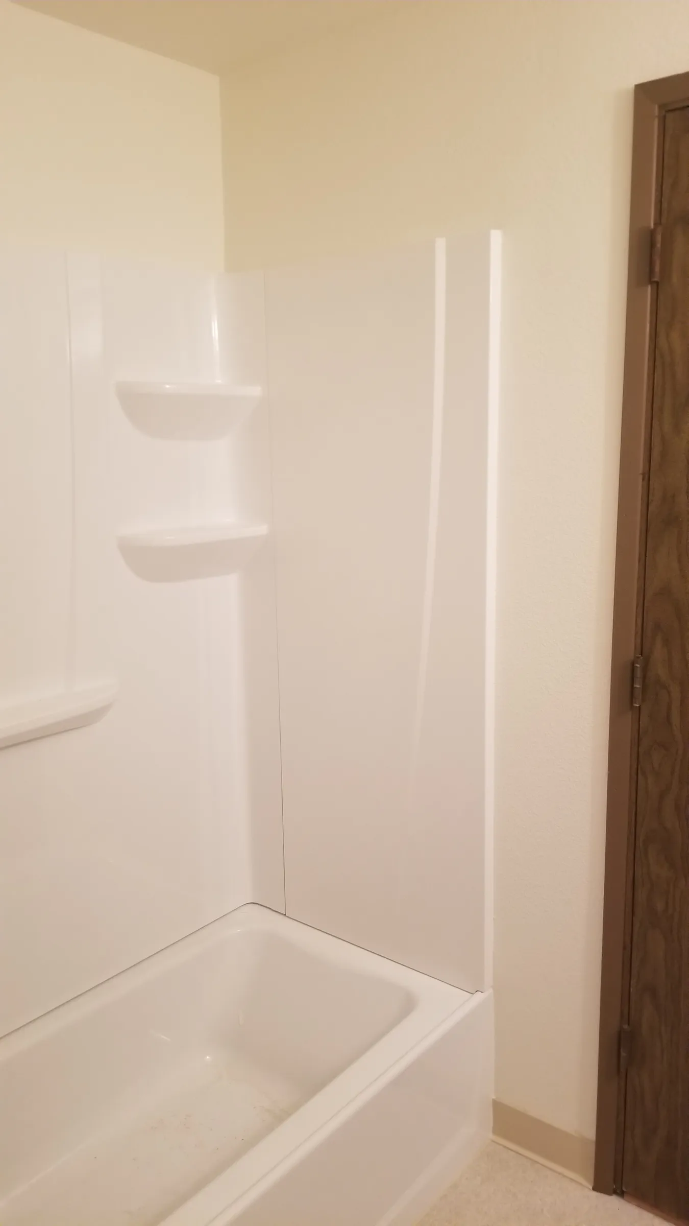 Finished tub-shower from the doorway.