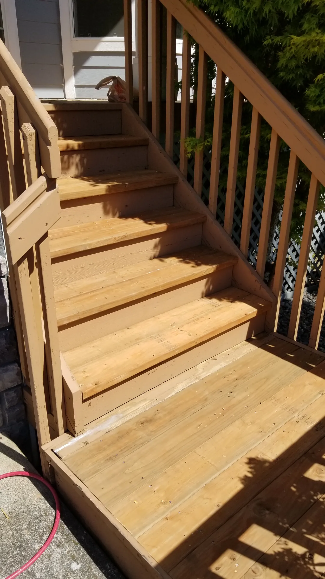 Install: New treads and landing boards installed over the repaired framing.