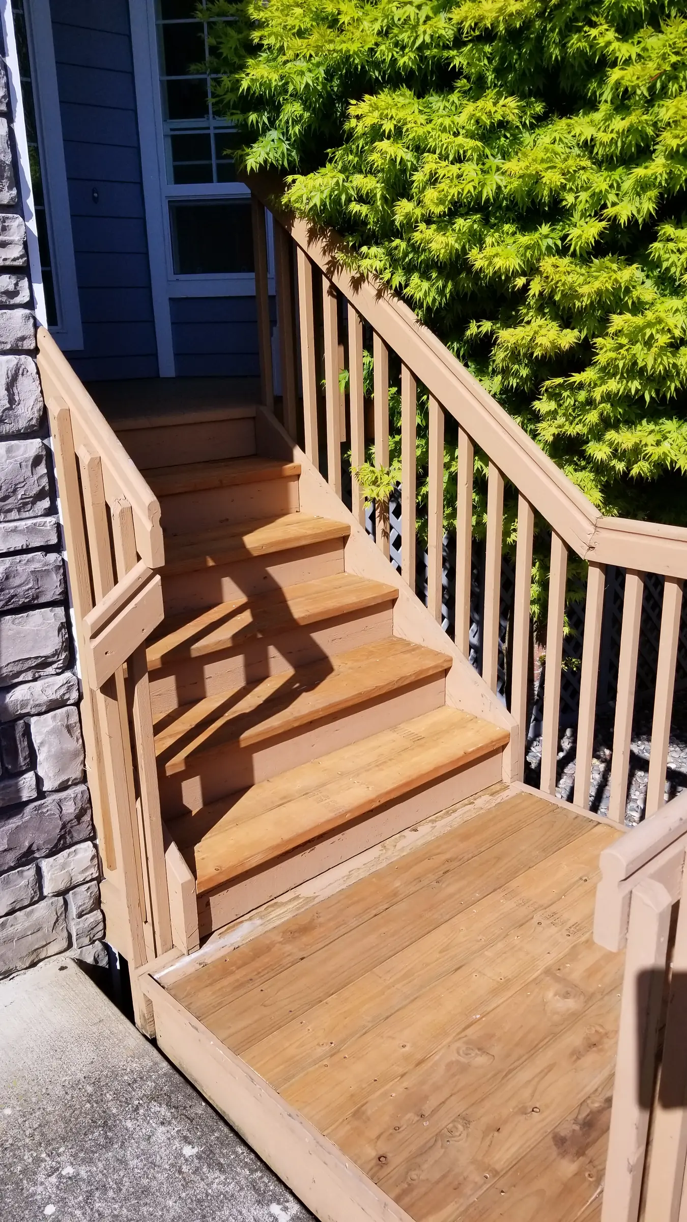 Done: Rebuilt stairs and landing with the finish applied.