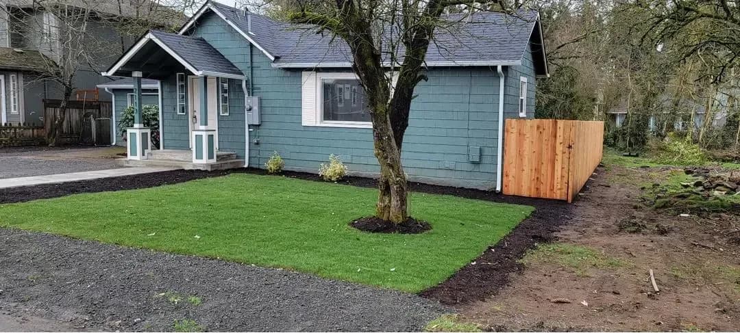 Done: Front yard finished — new lawn and fence.
