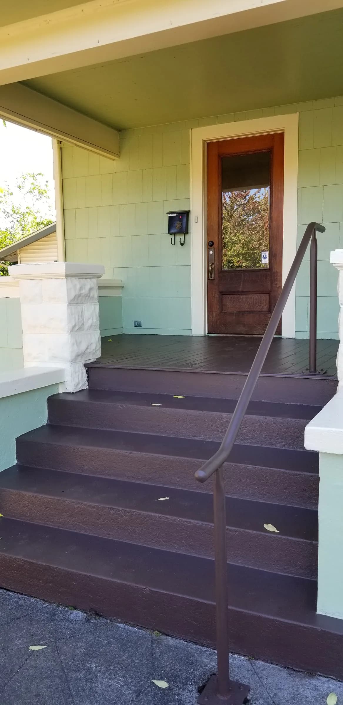 Done: Finished porch — painted steps and restored door