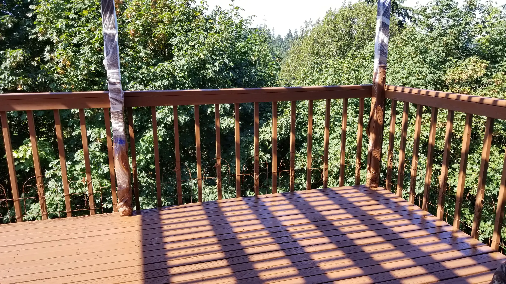 NW 131st Way pergola deck restained a warm brown with Sherwin-Williams SuperDeck