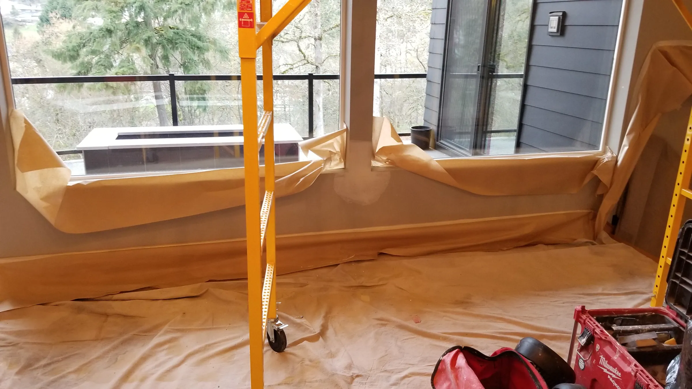 Paint: Windows masked and floors covered for the finish work.