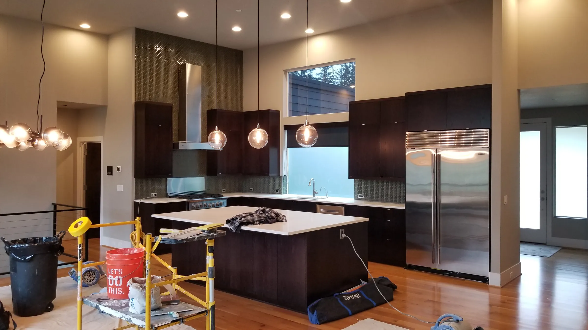 Paint: Kitchen work zone with scaffold and supplies.