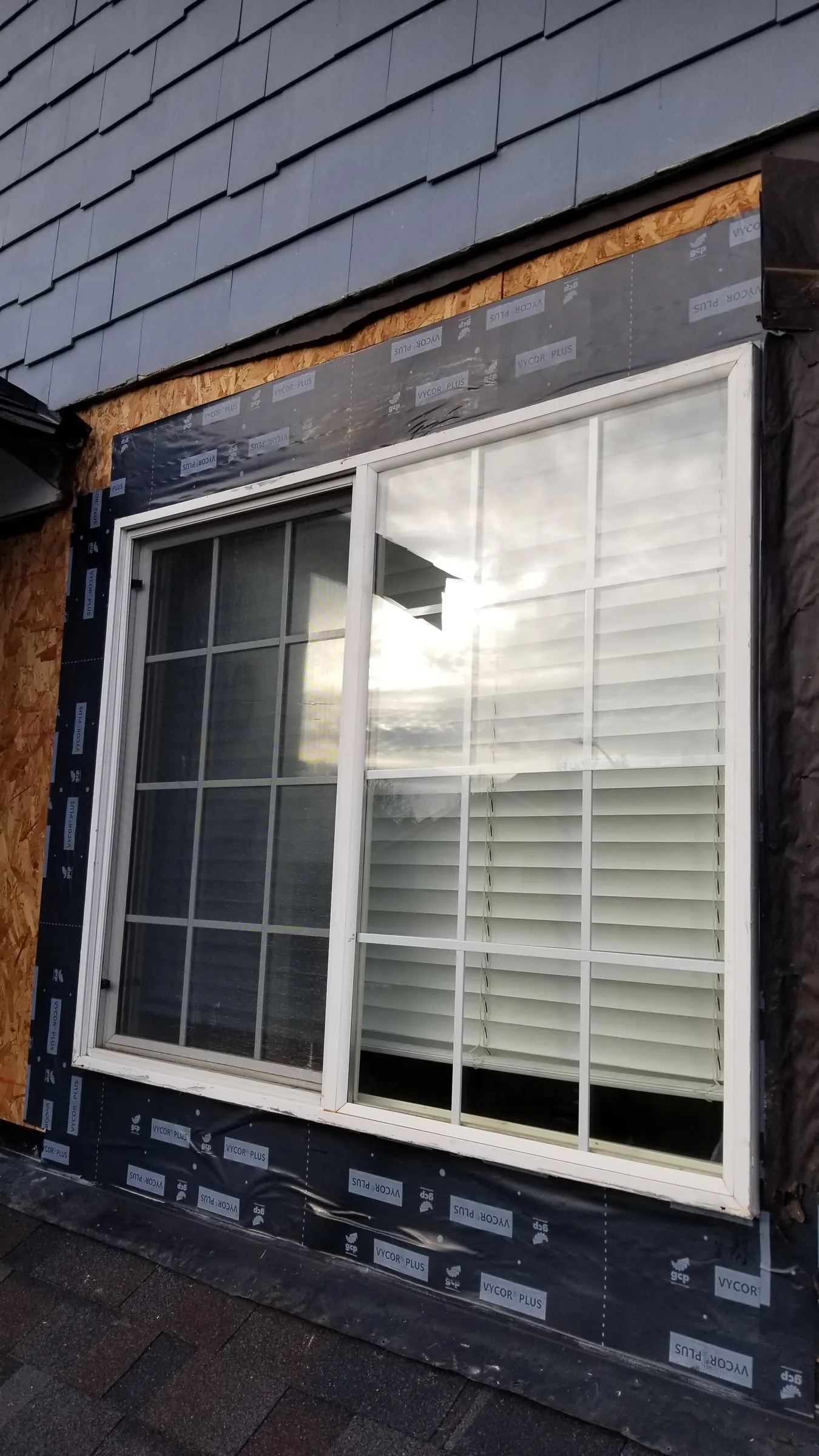 Install: New building paper and flashing around the window